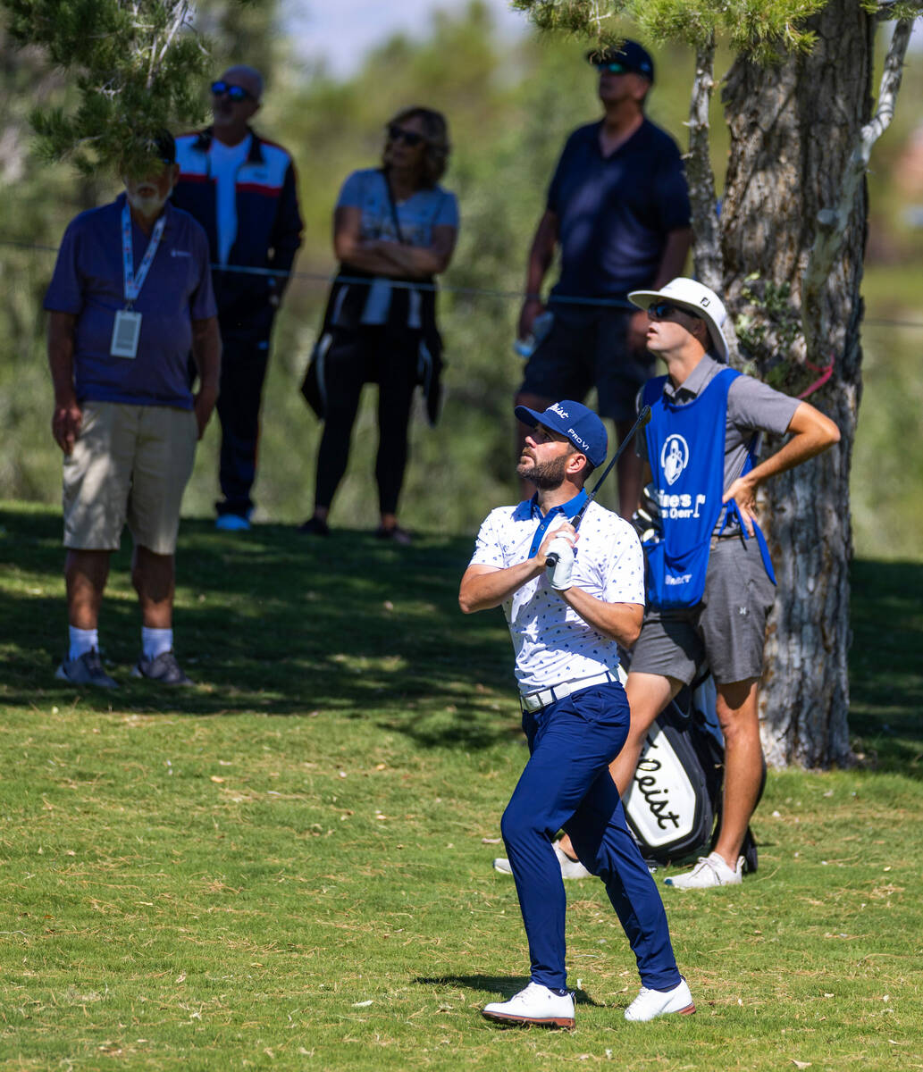 Callum Tarren and his caddie watch a shot on hole 16 during day 3 play at the Shriners Children ...