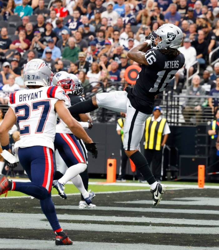 Raiders wide receiver Jakobi Meyers (16) comes down with a touchdown catch during the first hal ...