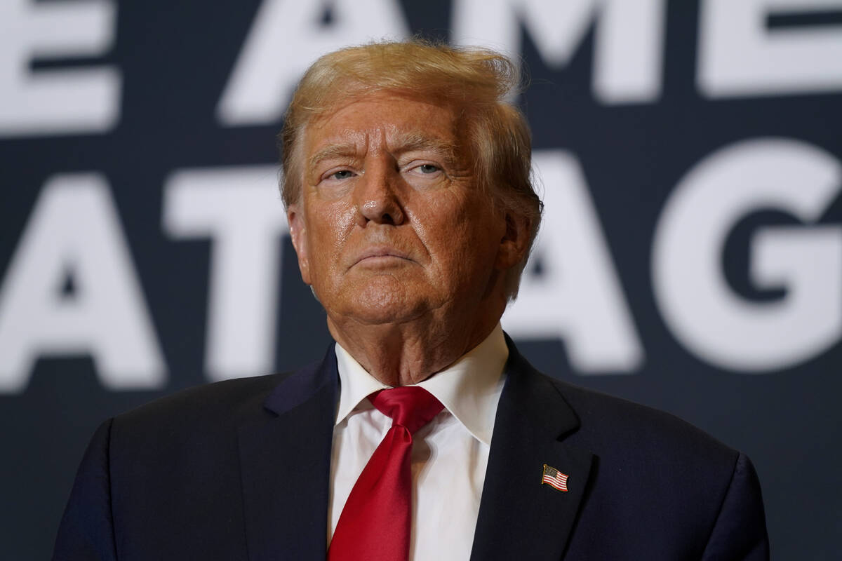 Former President Donald Trump arrives at a commit to caucus rally, Saturday, Oct. 7, 2023, in C ...