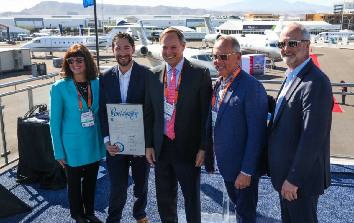 Clark County Director of Aviation Rosemary Vassiliadis, from left, Clark County Commissioner Mi ...