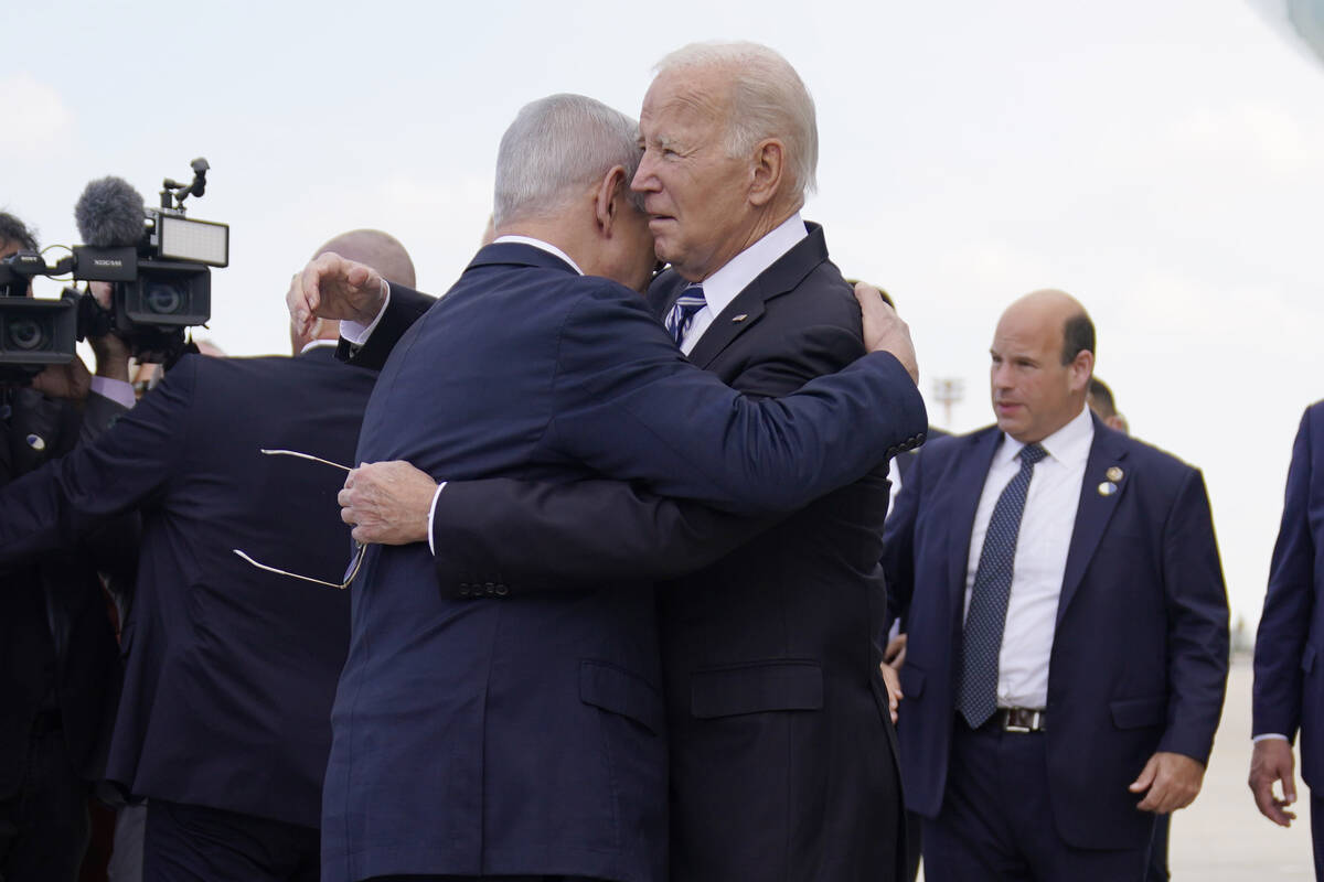 President Joe Biden is greeted by Israeli Prime Minister Benjamin Netanyahu after arriving at B ...