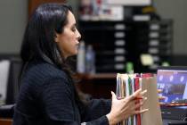 Arlene Heshmati, a public defender, prepares her clients files during a competency hearing at t ...