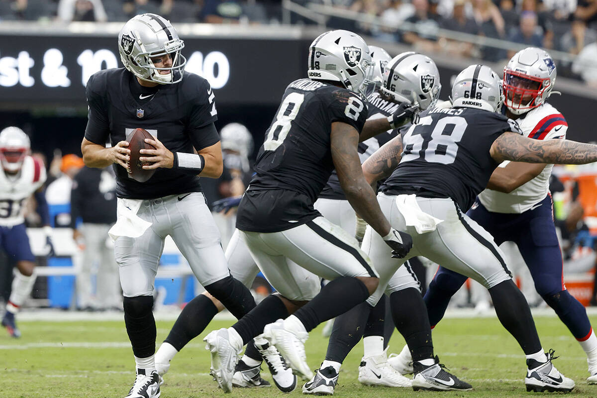 Raiders quarterback Brian Hoyer (7) prepares to throw against New England Patriots during the s ...