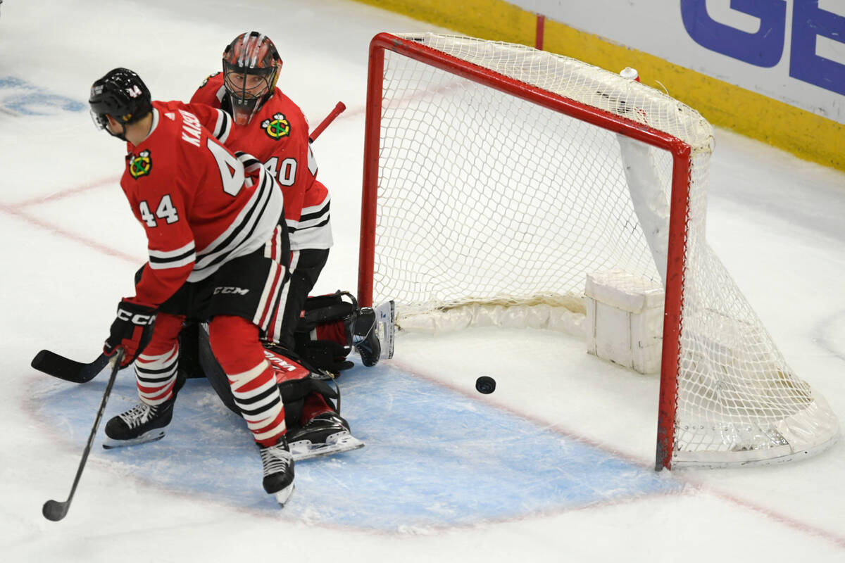 Chicago Blackhawks goalie Arvid Soderblom (40) watches the puck go into the net for a goal by V ...