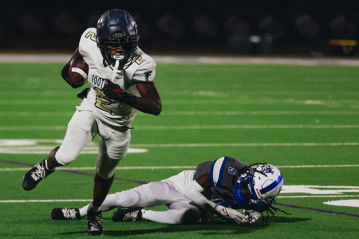 Foothill wide receiver Terrell Mack-Lovely (2) runs with the ball during a game against Basic a ...