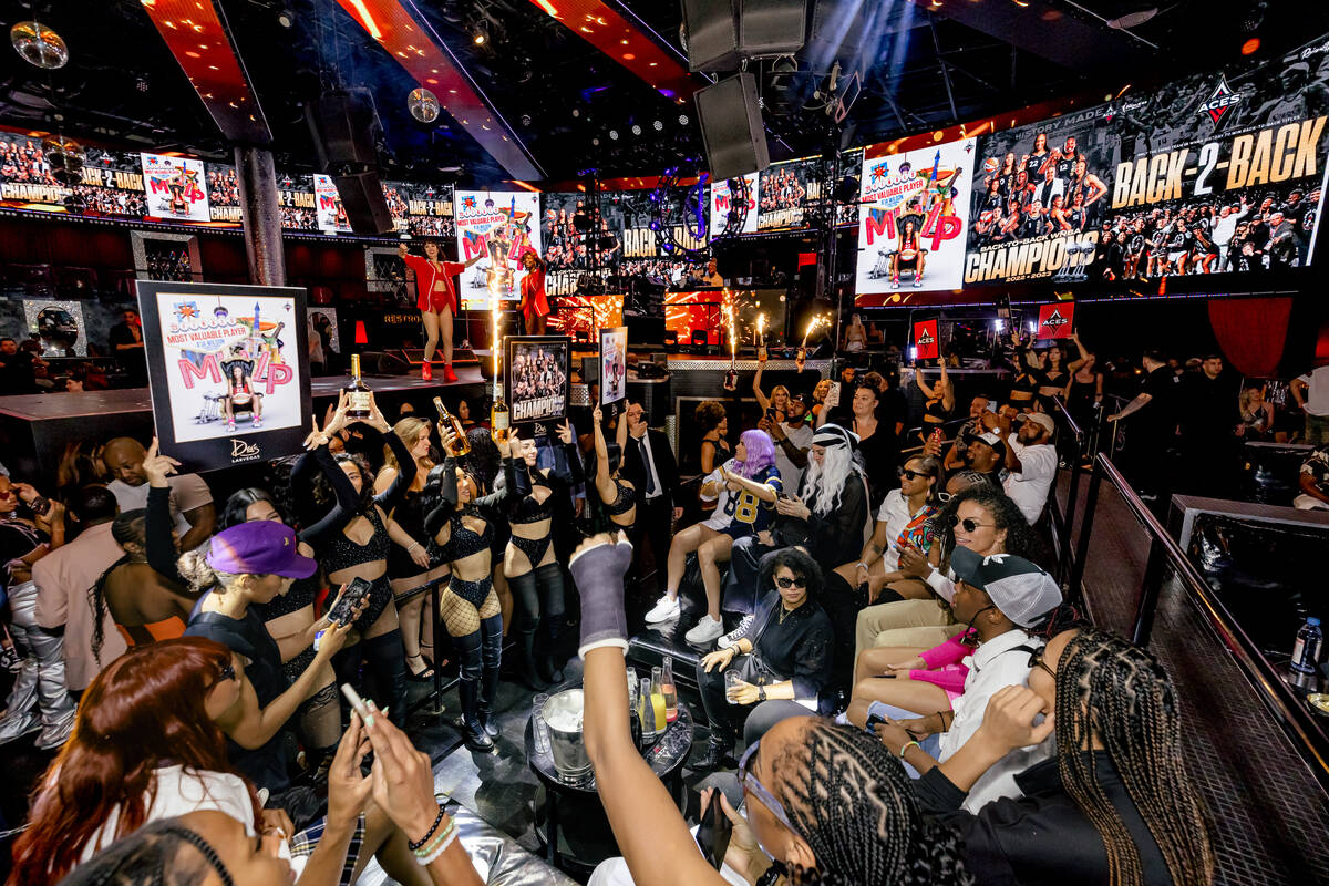 Members of the Las Vegas Aces are shown celebrating their second straight WNBA title at Drai's ...