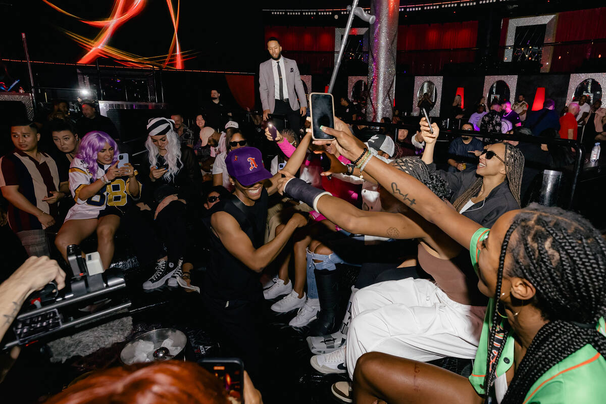 Members of the Las Vegas Aces are shown celebrating their second straight WNBA title at Drai's ...