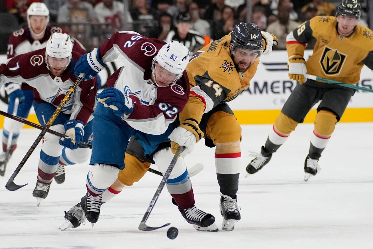 Colorado Avalanche's Artturi Lehkonen (62) and Vegas Golden Knights defenseman Nicolas Hague (1 ...