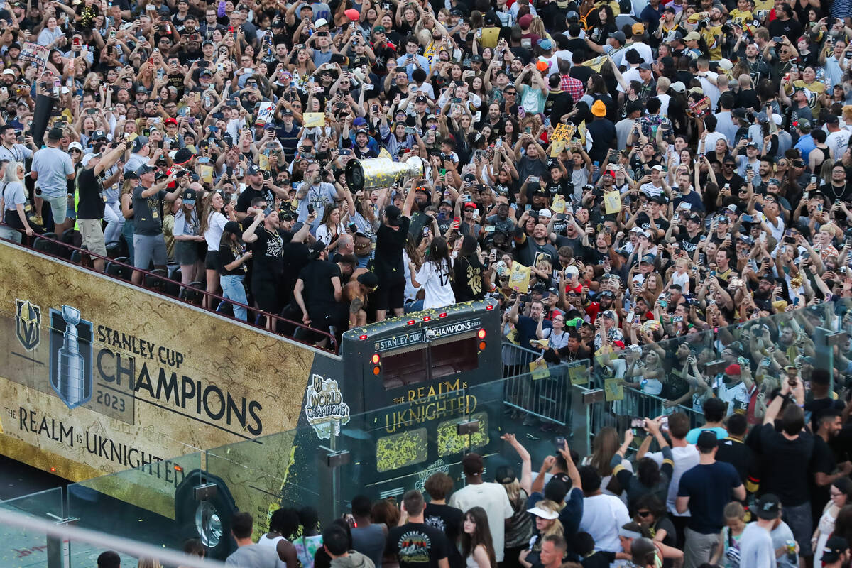 The Stanley Cup is lifted up in front of fans during the Vegas Golden Knights Stanley Cup Champ ...