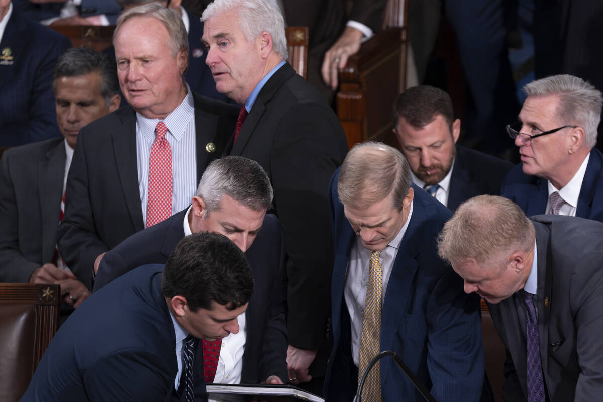 FILE - Rep. David Joyce, R-Ohio, upper left, confers with House Majority Whip Tom Emmer, R-Minn ...