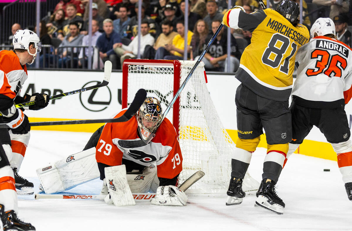 Golden Knights right wing Jonathan Marchessault (81) catches Philadelphia Flyers goaltender Car ...