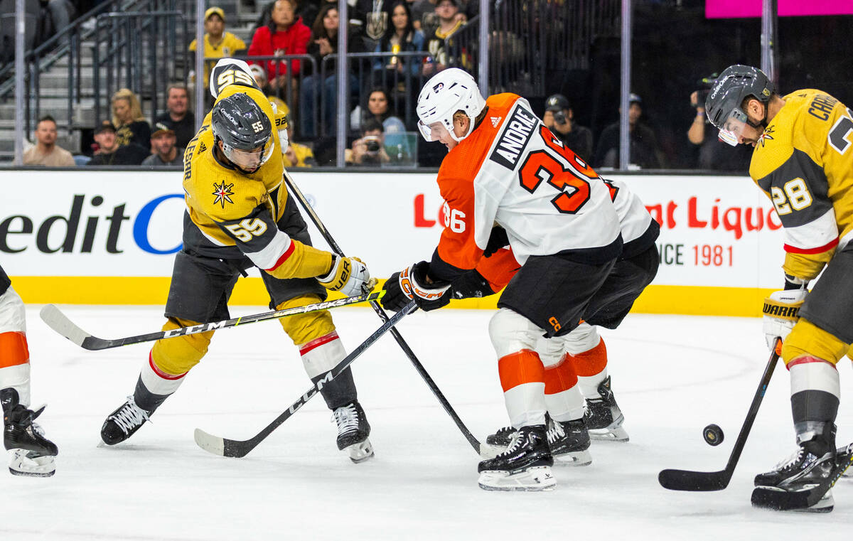 Golden Knights right wing Keegan Kolesar (55) shoots the puck past Philadelphia Flyers defensem ...