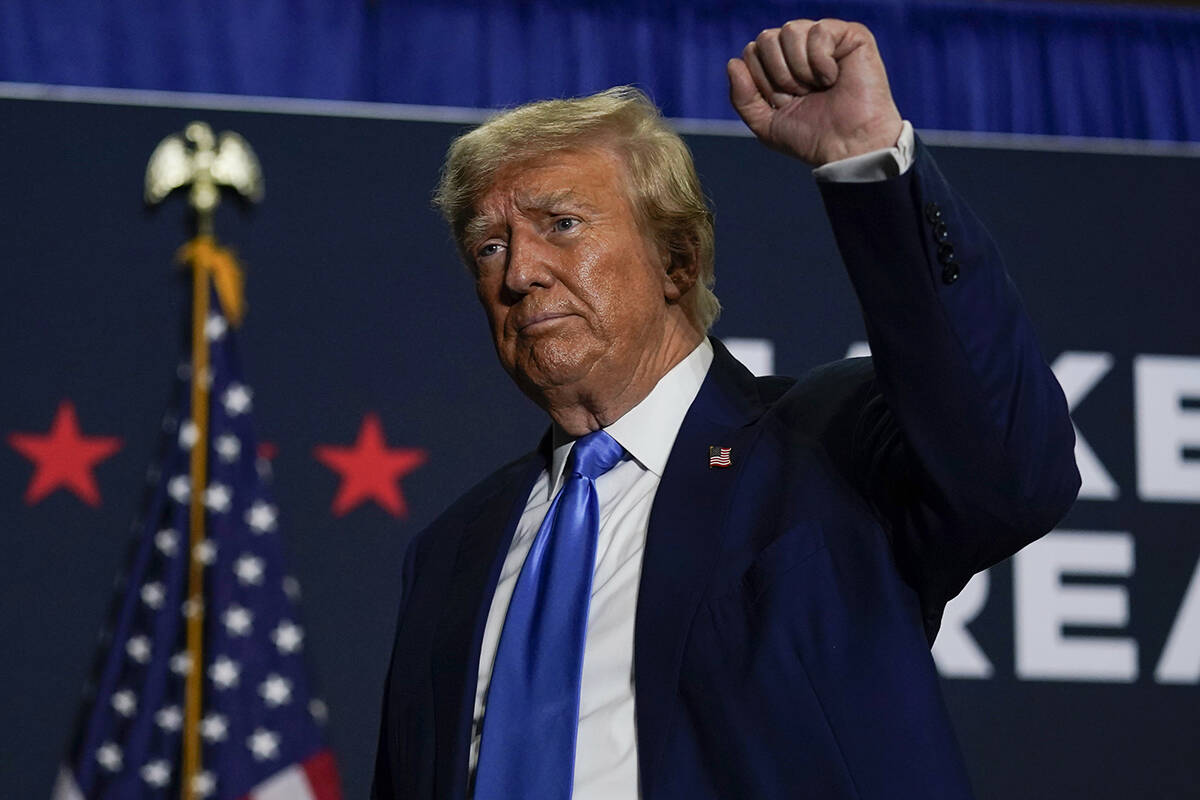 Republican presidential candidate former President Donald Trump gestures after speaking at a ca ...