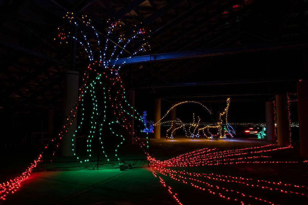 Cars tour through Glittering Lights at Las Vegas Motor Speedway in Las Vegas on Monday Nov. 30, ...