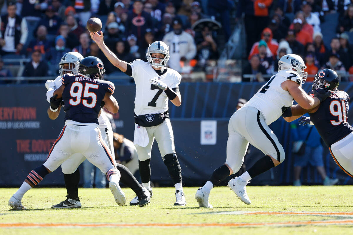 Las Vegas Raiders quarterback Brian Hoyer (7) passes the ball during the second half of an NFL ...