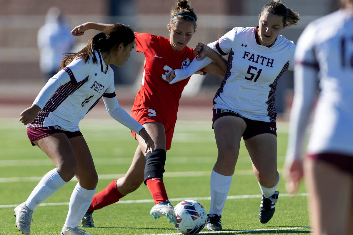 Coronado’s Liliana Schuth (3) dribbles between Faith Lutheran’s Ana Coe, left, an ...