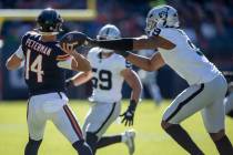 Raiders defensive end Tyree Wilson (9) gets a strip sack on Chicago Bears quarterback Nathan Pe ...