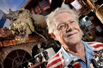 Dr. Lonnie Hammargren stands in his back yard with some of his treasures. (Las Vegas Review-Jou ...