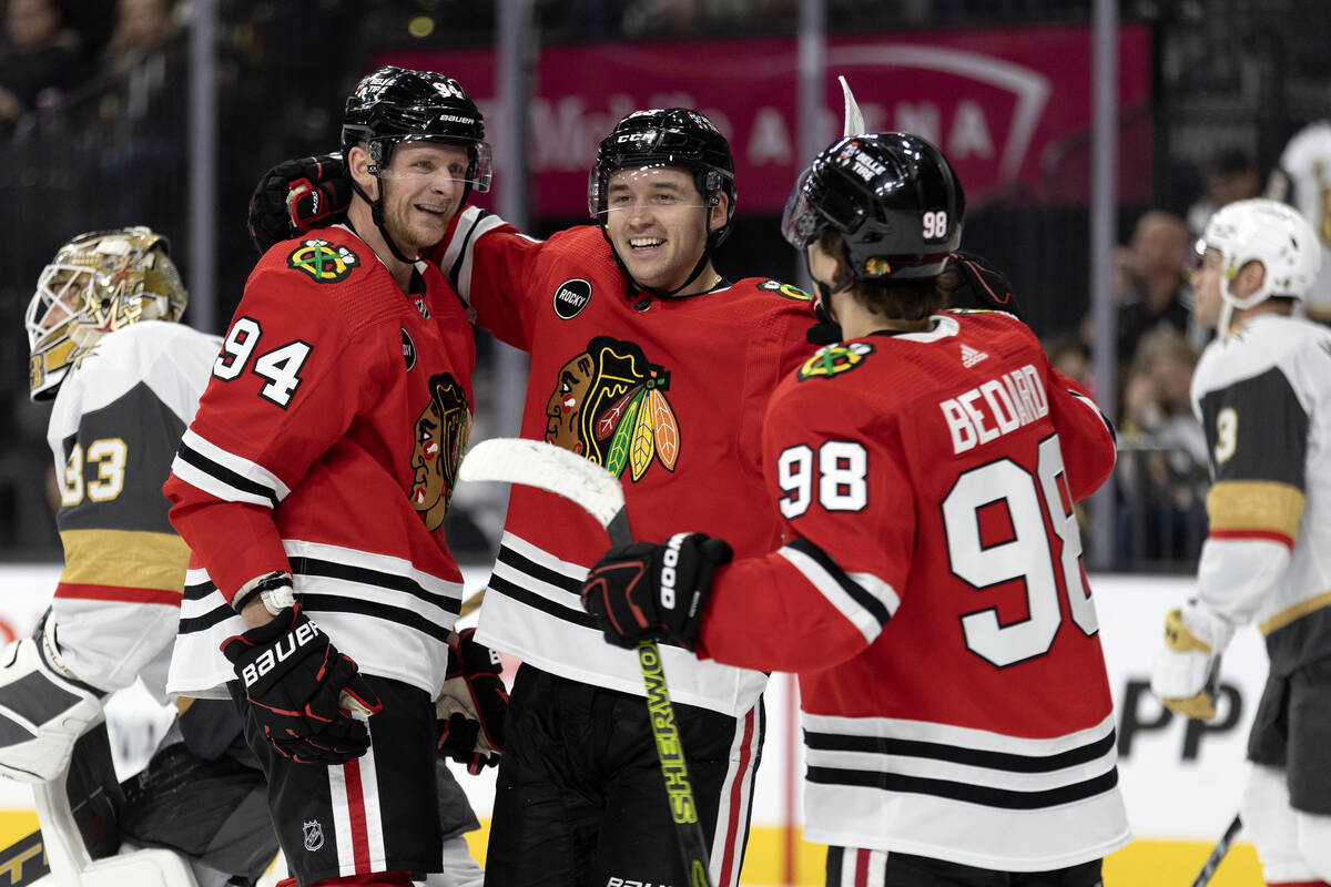 Blackhawks right wing Corey Perry (94), center Philipp Kurashev (23) and center Connor Bedard ( ...