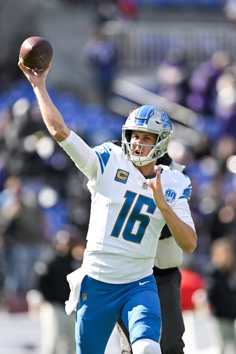 Detroit Lions quarterback Jared Goff (16) throws during pre-game warm-ups before an NFL footbal ...