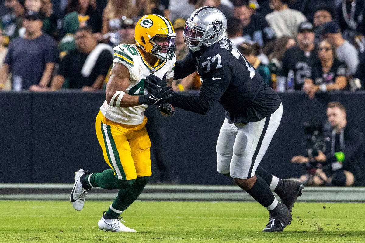 Raiders offensive tackle Thayer Munford Jr. (77) works against Green Bay Packers linebacker Eri ...