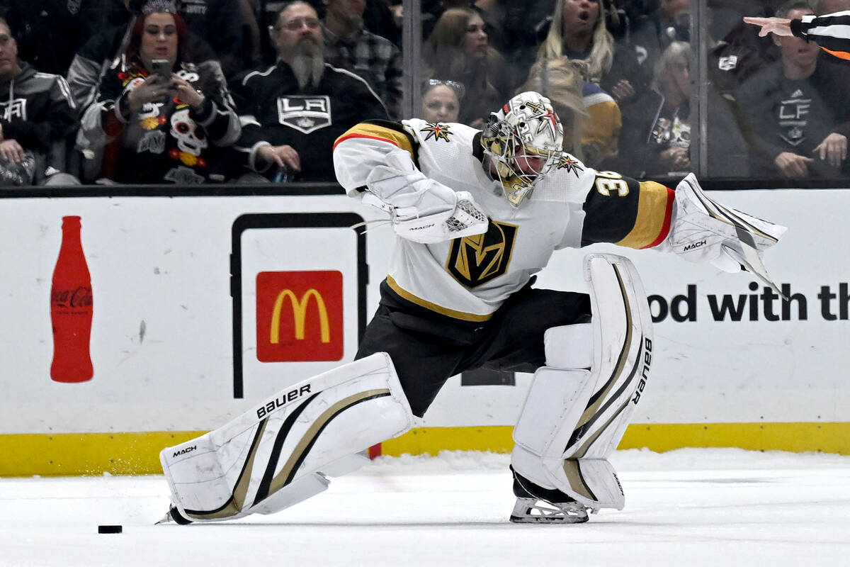 Vegas Golden Knights goaltender Logan Thompson reacts after stopping a shot by Los Angeles King ...