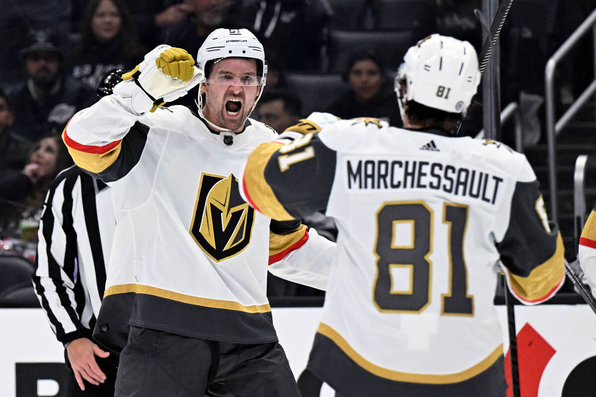 Vegas Golden Knights right wing Mark Stone, left, celebrates his goal against the Los Angeles K ...