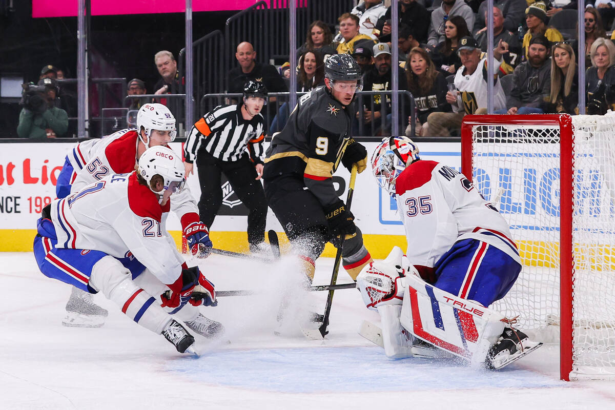 Golden Knights center Jack Eichel (9) takes a shot against Montreal Canadiens goaltender Sam Mo ...