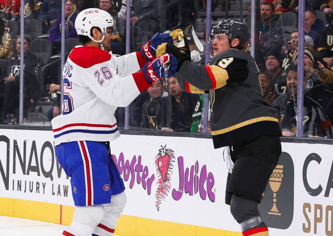 Golden Knights center Jack Eichel (9) and Montreal Canadiens defenseman Johnathan Kovacevic (26 ...