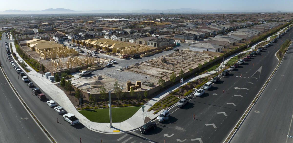 Cars line up to get free gas from Smith’s Marketplace on Thursday June 16, 2022, in Las Vegas ...