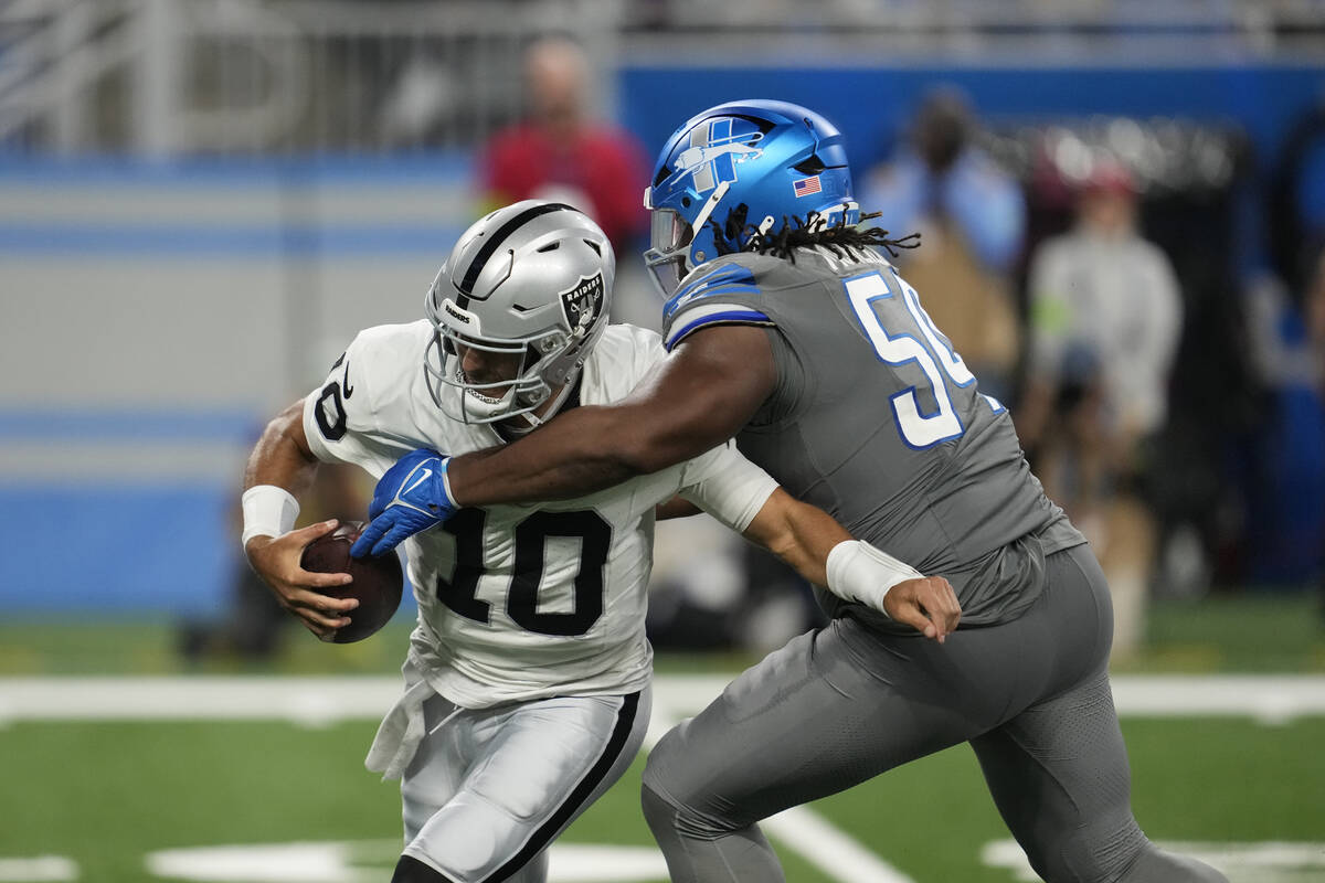 Detroit Lions defensive tackle Alim McNeill (54) sacks Las Vegas Raiders quarterback Jimmy Garo ...