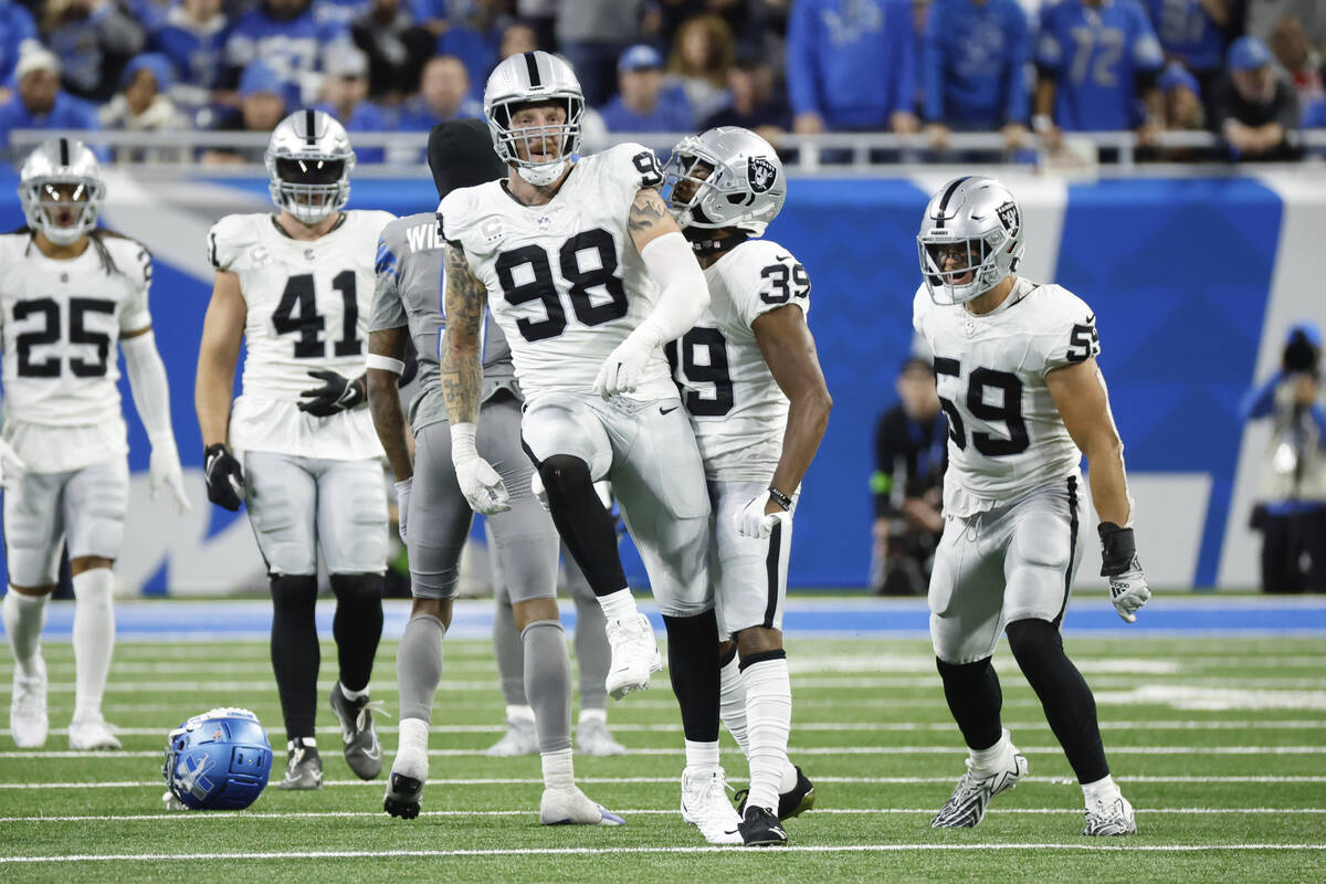 Las Vegas Raiders defensive end Maxx Crosby (98) celebrates against the Detroit Lions in the fi ...