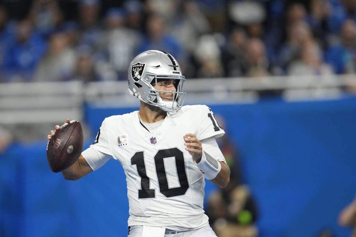 Las Vegas Raiders quarterback Jimmy Garoppolo throws during the second half of an NFL football ...