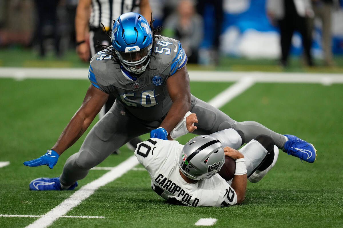 Detroit Lions defensive tackle Alim McNeill (54) sacks Las Vegas Raiders quarterback Jimmy Garo ...