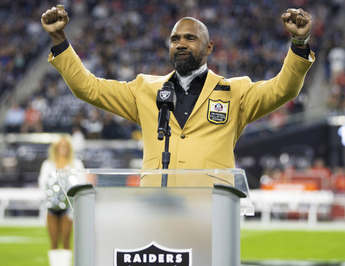 Raider Pro Football Hall of Fame inductee Charles Woodson speaks before the start of an NFL foo ...