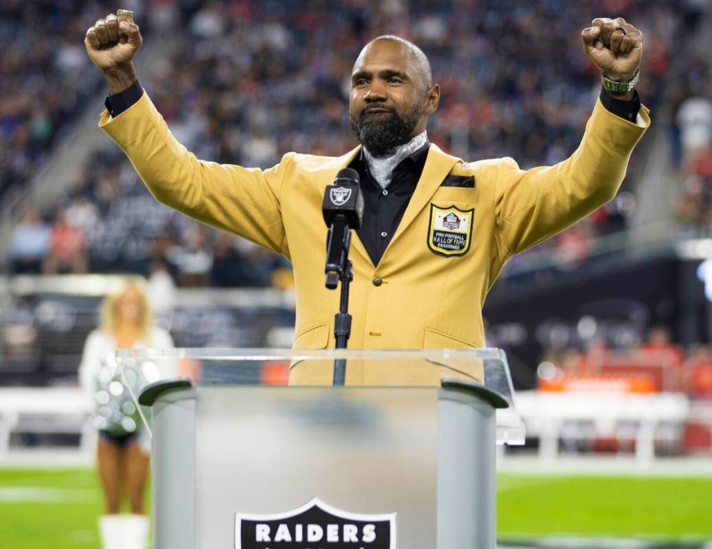 Raider Pro Football Hall of Fame inductee Charles Woodson speaks before the start of an NFL foo ...