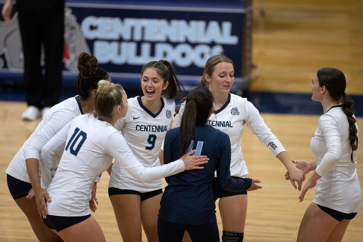 Centennial celebrates after scoring during a Class 5A Southern Region quarterfinal girls volley ...