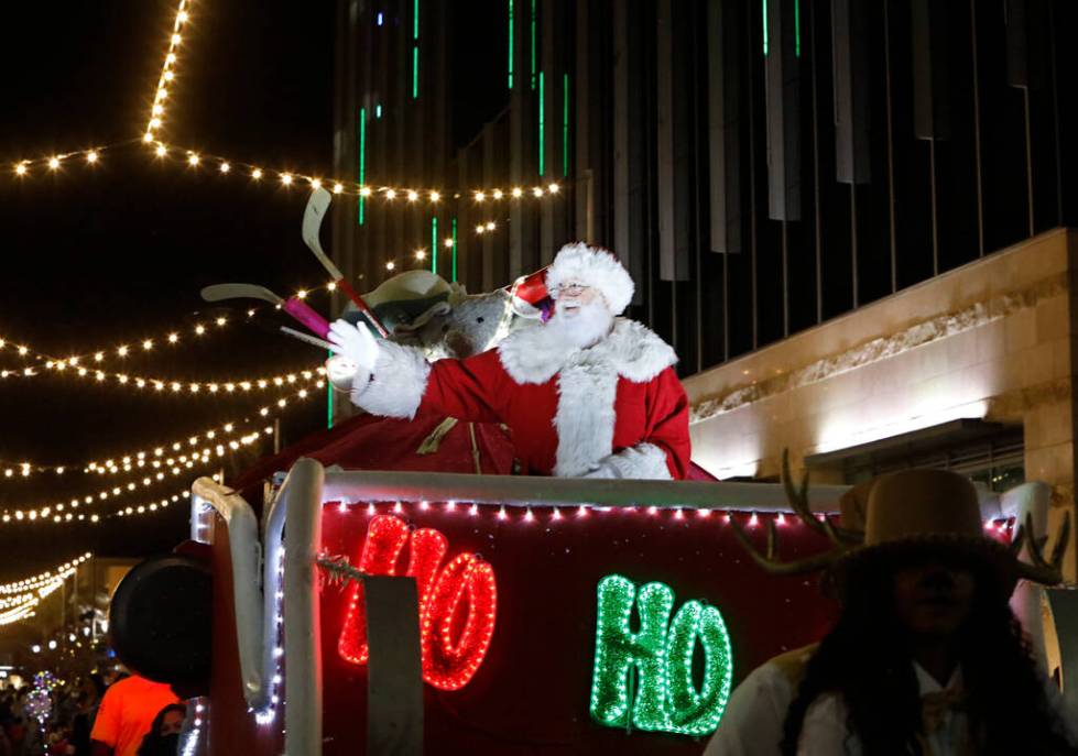 Santa waves during the holiday parade at Downtown Summerlin on Friday, Dec. 3, 2021, in Las Veg ...