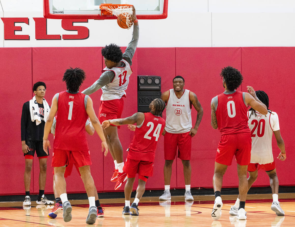 UNLV's men's basketball forward Jacob Bannarbie (12) dunks during team practice, on Wednesday, ...