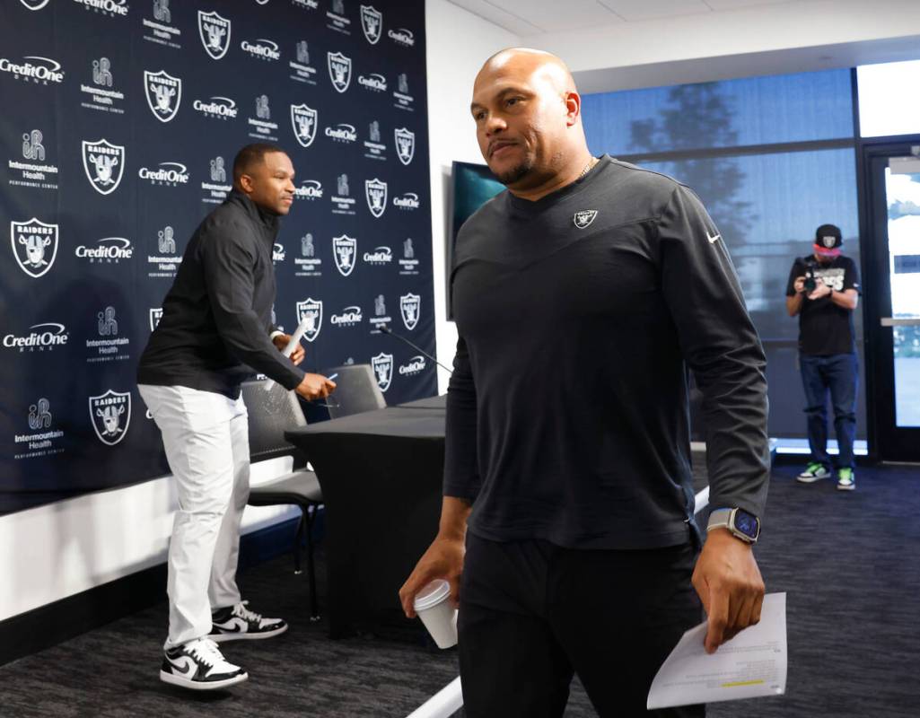 Champ Kelly, Raiders interim general manager, left, and Antonio Pierce, interim head coach, lea ...