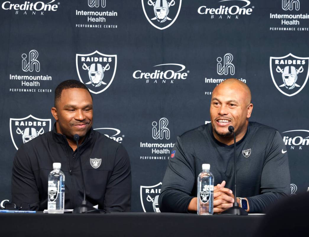 Champ Kelly, Raiders interim general manager, left, and Antonio Pierce, interim head coach, smi ...