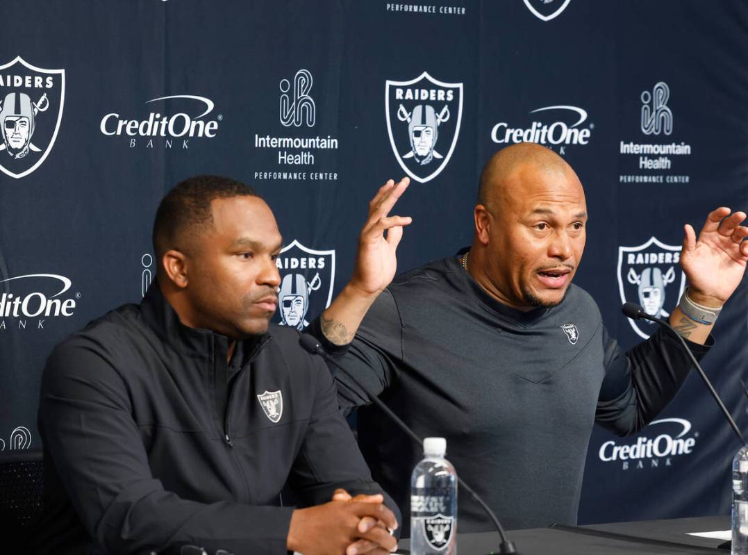 Antonio Pierce, Raiders interim head coach, speaks during the press conference as Champ Kelly, ...