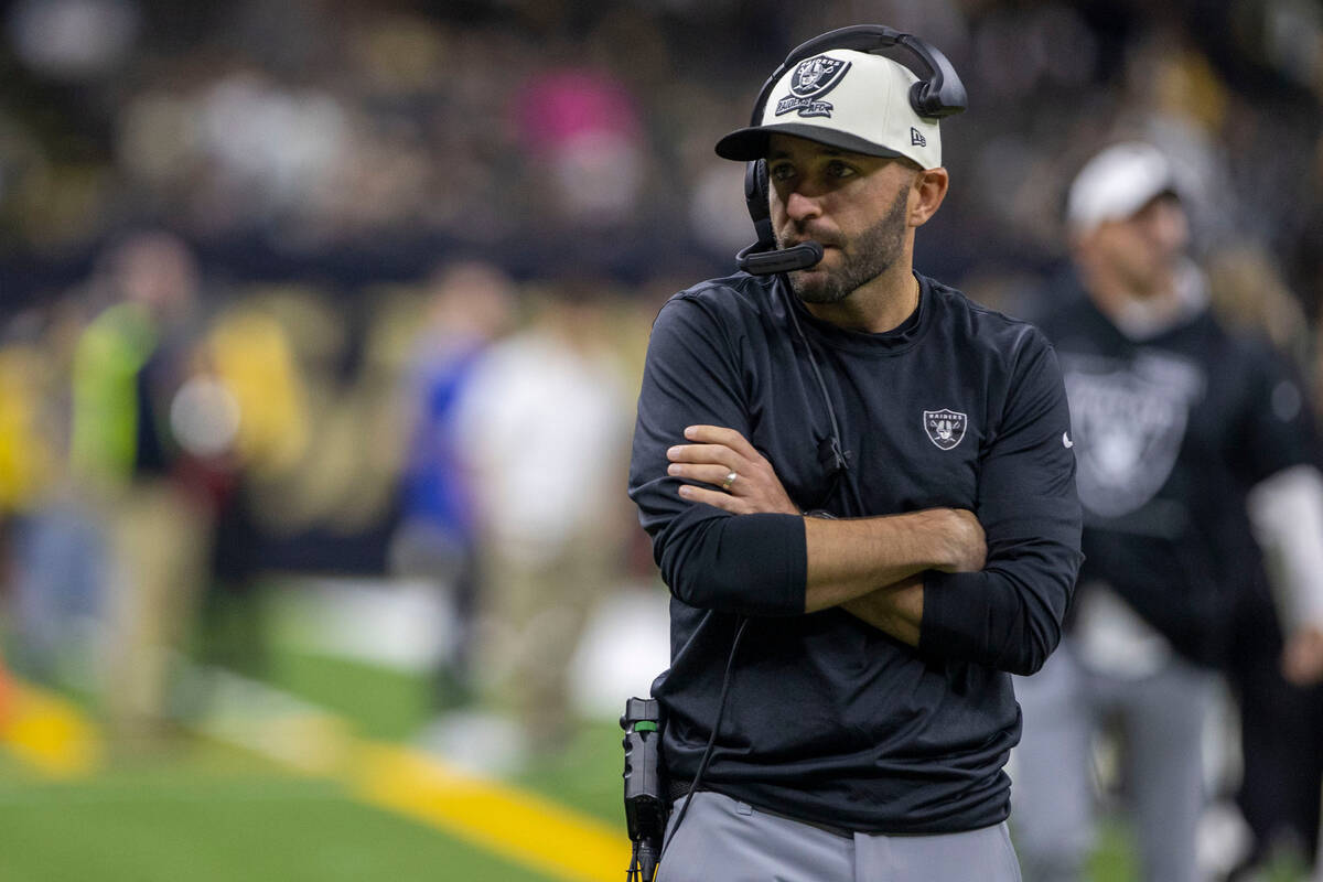 Raiders offensive coordinator Mick Lombardi walks the sideline before an NFL game against the N ...