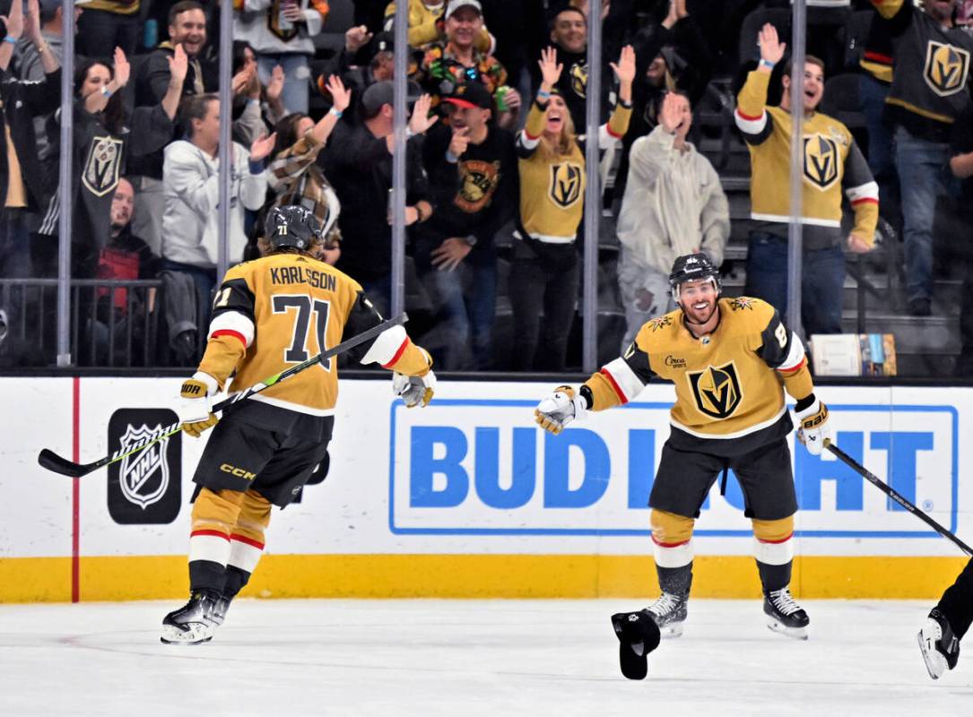 Vegas Golden Knights center William Karlsson (71) and right wing Jonathan Marchessault (81) cel ...