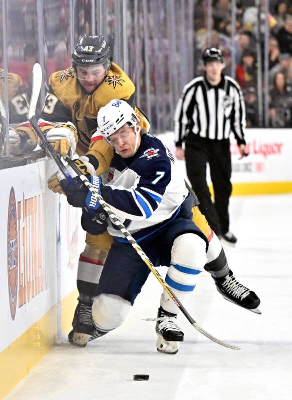 Vegas Golden Knights center Paul Cotter (43) and Winnipeg Jets center Vladislav Namestnikov (7) ...