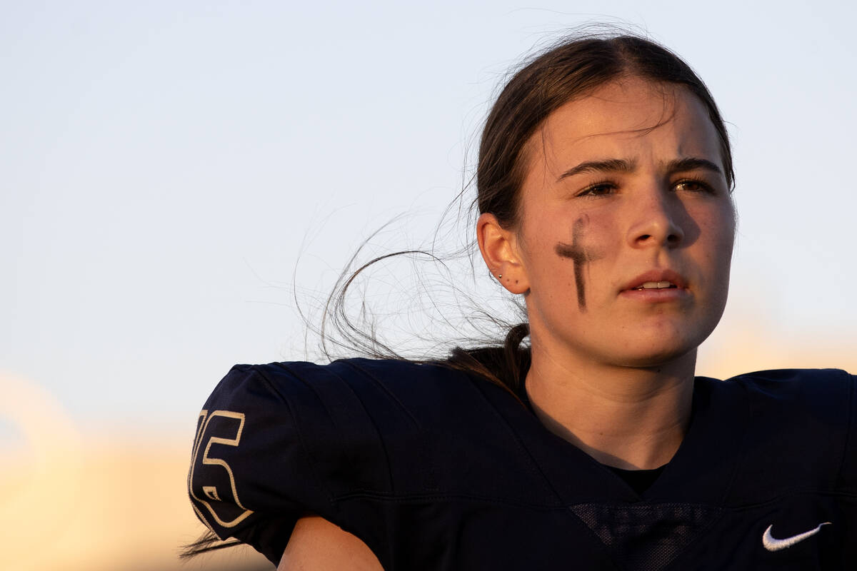 Kicker Gracie Rhodes warms up before her team’s Class 2A high school football game again ...