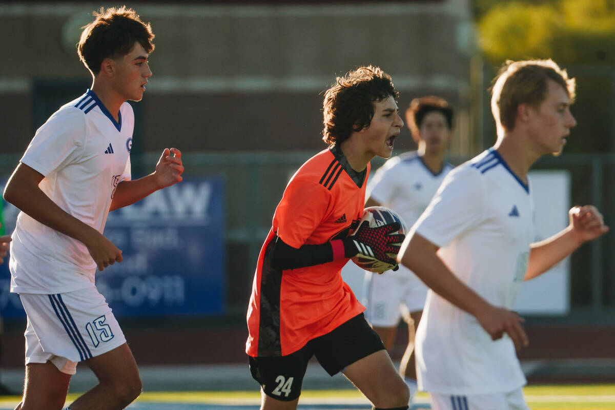 Bishop Gorman goalie Chase Cosenza (24) yells to his teammate as he throws the ball down the fi ...