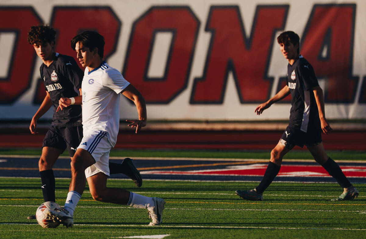 Bishop Gorman’s Charles Au (12) kicks the ball during a Class 5A Southern League semifin ...