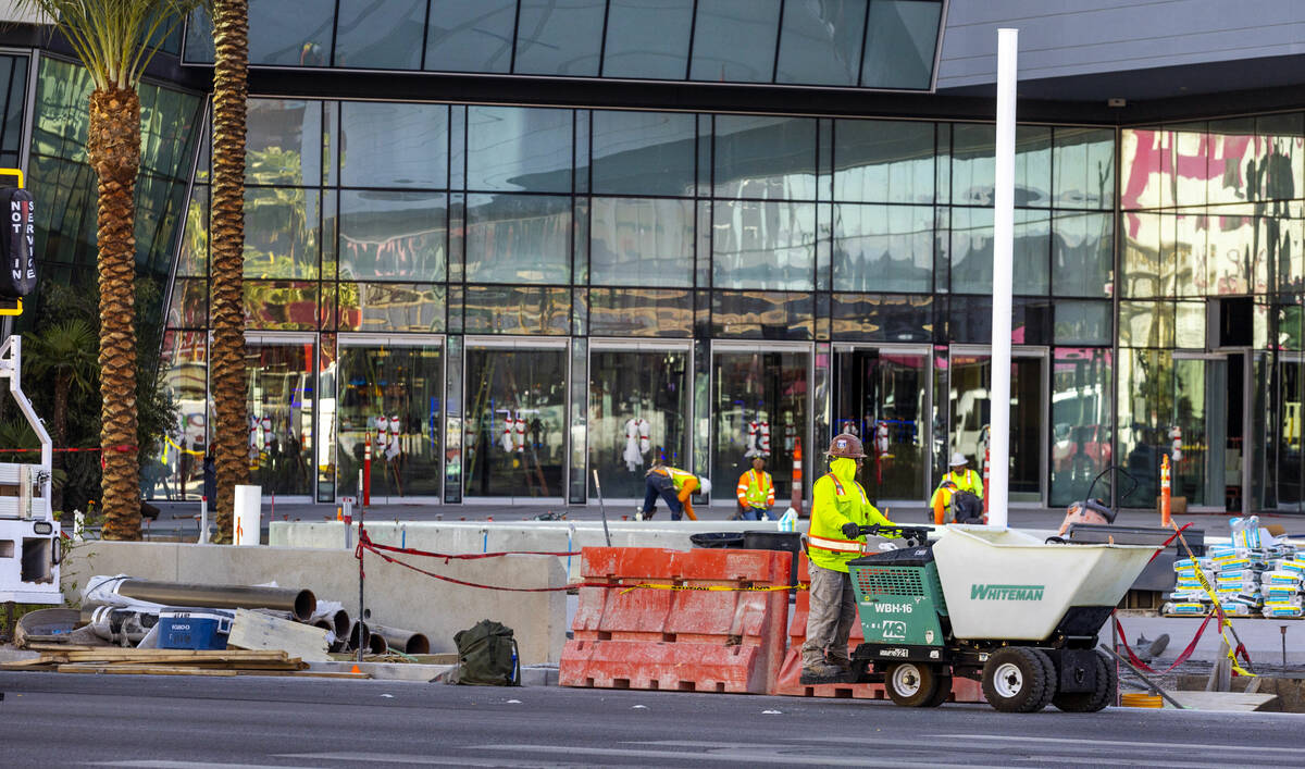 Construction workers are busy with projects nearing the end about the exterior at the Fontaineb ...