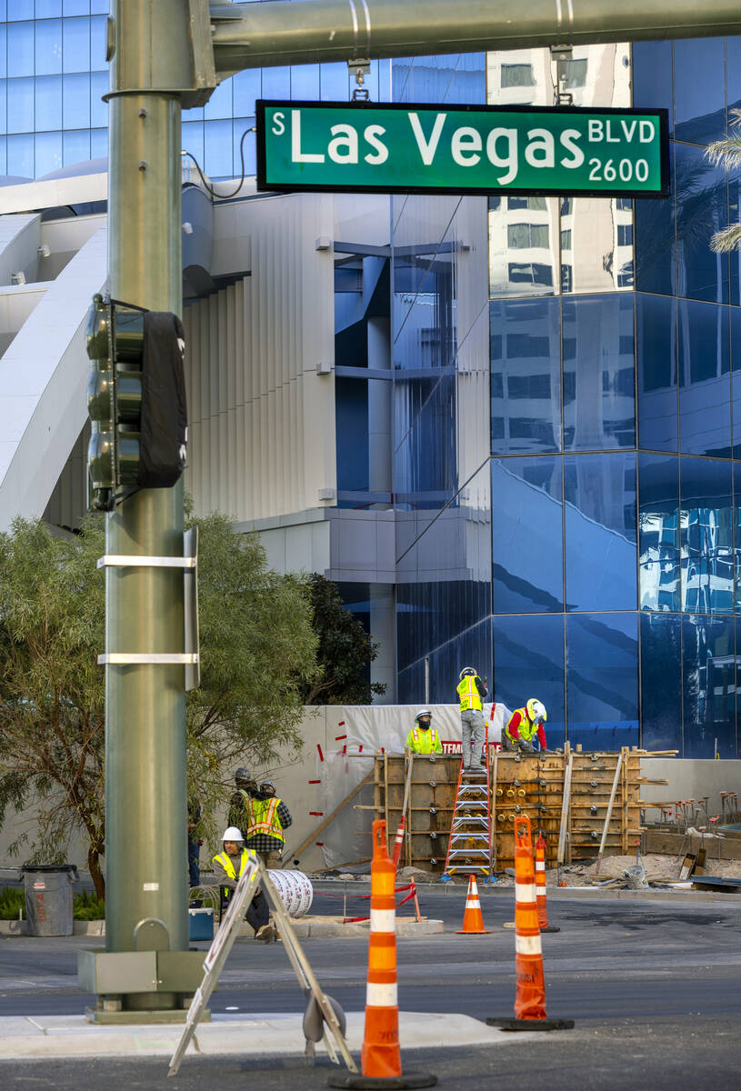 Construction workers are busy with projects nearing the end about the exterior at the Fontaineb ...